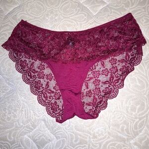 A pair of Pure Beauty by Rene Rofe lingerie lacy panties in a size 3X.